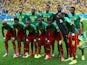 Cameroon pose for a team photo prior to the 2014 FIFA World Cup Brazil Group A match between Cameroon and Brazil at Estadio Nacional on June 23, 2014