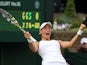 France's Caroline Garcia celebrates winning her women's singles first round match against Italy's Sara Errani on day two of the 2014 Wimbledon Championships at The All England Tennis Club in Wimbledon, southwest London, on June 24, 2014