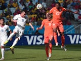 Chile's defender Gary Medel and Netherlands' midfielder Georginio Wijnaldum vie during the Group B football match between Netherlands and Chile at the Corinthians Arena in Sao Paulo during the 2014 FIFA World Cup on June 23, 2014