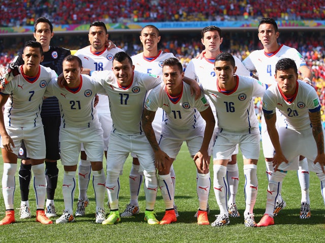 Chile players pose for a team photo prior to the 2014 FIFA World Cup Brazil Group B match between the Netherlands and Chile at Arena de Sao Paulo on June 23, 2014