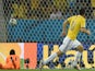 Uruguay's goalkeeper Fernando Muslera fails to save Colombia's midfielder James Rodriguez' (R) shot during the Round of 16 football match between Colombia and Uruguay at the Maracana Stadium in Rio de Janeiro during the 2014 FIFA World Cup in Brazil on Ju