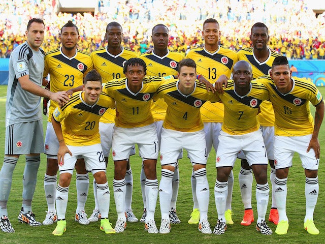 Colombia players pose for a team photo prior to the 2014 FIFA World Cup Brazil Group C match between Japan and Colombia at Arena Pantanal on June 24, 2014