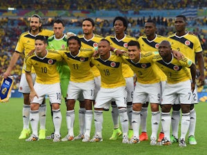 Colombia pose for a team photo prior to the 2014 FIFA World Cup Brazil round of 16 match between Colombia and Uruguay at Maracana on June 28, 2014 