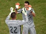 Colombia's goalkeeper David Ospina (R) is substitued by Colombia's goalkeeper Faryd Mondragon during a Group C football match on June 24, 2014