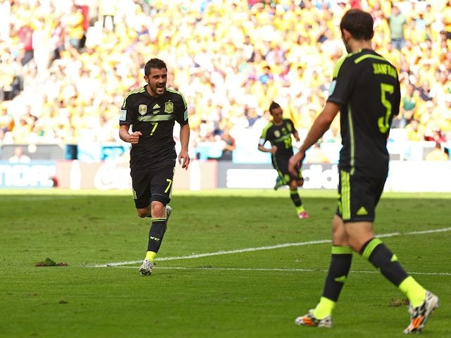 Spain's David Villa celebrates scoring the opener against Australia on June 23, 2014.