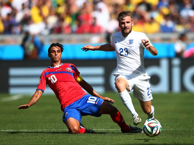  Luke Shaw of England is challenged by Bryan Ruiz of Costa Rica during the 2014 FIFA World Cup Brazil Group D match between Costa Rica and England at Estadio Mineirao on June 24, 2014
