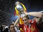 Spanish forward Fernando Torres holds the Euro 2008 championships trophye after winning the final football match against Germany on June 29, 2008