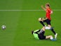 Spanish forward Fernando Torres (C) kicks the ball and scores in front of German goalkeeper Jens Lehmann (L) and German defender Philipp Lahm (R) during the Euro 2008 final on June 29, 2008