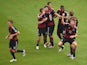 Thomas Muller of Germany celebrates scoring his team's first goal with teammates during the 2014 FIFA World Cup Brazil group G match between the United States and Germany at Arena Pernambuco on June 26, 2014