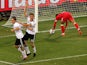 Thomas Muller of Germany celebrates scoring with team mate Mesut Ozil during the 2010 FIFA World Cup South Africa Round of Sixteen match between Germany and England at Free State Stadium on June 27, 2010