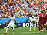 Ghana's defender John Boye scores an own goal during the Group G football match between Portugal and Ghana at the Mane Garrincha National Stadium in Brasilia during the 2014 FIFA World Cup on June 26, 2014