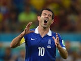 Greece's midfielder and captain Giorgos Karagounis reacts during a Round of 16 football match between Costa Rica and Greece at Pernambuco Arena in Recife during the 2014 FIFA World Cup on June 29, 2014