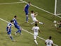 :Greece's defender Sokratis Papastathopoulos scores during a Round of 16 football match between Costa Rica and Greece at Pernambuco Arena in Recife during the 2014 FIFA World Cup on June 29, 2014