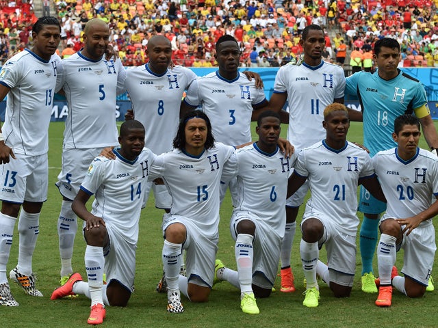 Honduras' squad pose for a group picture before the start of the Group E football match between Honduras and Switzerland at the Amazonia Arena in Manaus during the 2014 FIFA World Cup on June 25, 2014