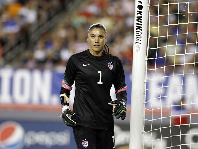 Goalkeeper Hope Solo #1 of the United States takes her position in goal during the second half of a women's friendly soccer match against France on June 14, 2014