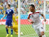 Reza Ghoochannejhad of Iran celebrates scoring his team's first goal during the 2014 FIFA World Cup Brazil Group F match between Bosnia and Herzegovina and Iran at Arena Fonte Nova on June 25, 2014