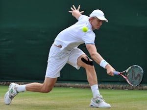 Anderson through in four sets