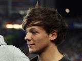  Louis Tomlinson of One Direction looks on from the sideline during the ANZAC Test match between the New Zealand Kiwis and the Australian Kangaroos at Eden Park on April 20, 2012