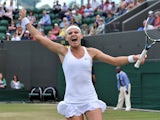 Czech Republic's Lucie Safarova celebrates match point during her women's singles third round match against Slovakia's Dominika Cibulkova on day five of the 2014 Wimbledon Championships at The All England Tennis Club in Wimbledon, southwest London, on Jun