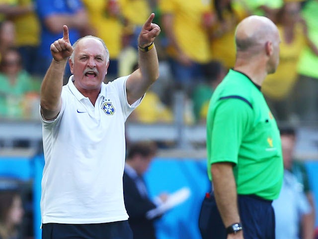 Head coach Luiz Felipe Scolari of Brazil reacts after a disallowed goal and a yellow card during the game with Chile on June 28, 2014