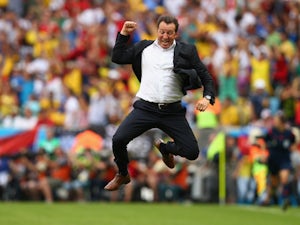 Head coach Marc Wilmots of Belgium jumps for joy after defeating Russia 1-0 during the 2014 FIFA World Cup Brazil Group H match at the Maracana in Rio de Janeiro on June 22, 2014