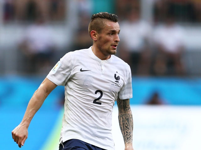 Mathieu Debuchy of France controls the ball during the 2014 FIFA World Cup Brazil Group E match between Switzerland and France at Arena Fonte Nova on June 20, 2014