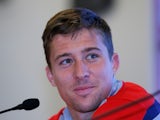 Matt Besler of the United States answers questions from the media during a press conference prior to their training session at Sao Paulo FC on June 10, 2014