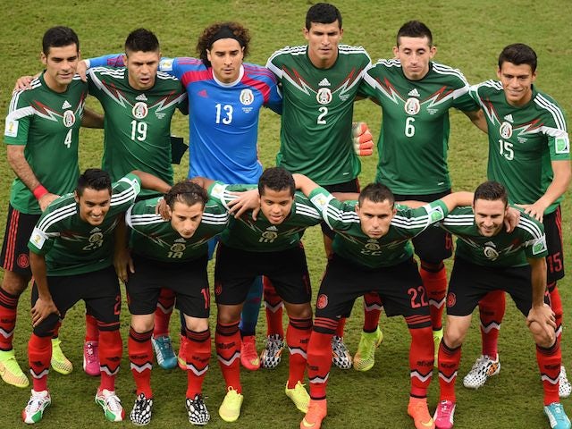 Mexico's players lineup before the game with Croatia on June 23, 2014
