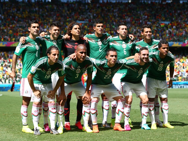 Mexico pose for a team photo prior to the 2014 FIFA World Cup Brazil Round of 16 match between Netherlands and Mexico at Castelao on June 29, 2014