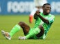 Michael Babatunde of Nigeria reacts after a possible injury during the 2014 FIFA World Cup Brazil Group F match against Argentina on June 25, 2014
