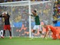 Mexico's defender and captain Rafael Marquez and Mexico's goalkeeper Guillermo Ochoa react after the awarding of a penalty after a tackle on Netherlands' forward Arjen Robben during a Round of 16 football match between Netherlands and Mexico at Castelao S