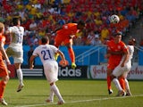 Leroy Fer of the Netherlands scores his team's first goal on a header during the 2014 FIFA World Cup Brazil Group B match between the Netherlands and Chile at Arena de Sao Paulo on June 23, 2014