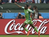 Nigeria's forward Ahmed Musa celebrates his second goal during a Group F football match between Nigeria and Argentina at the Beira-Rio Stadium in Porto Alegre during the 2014 FIFA World Cup on June 25, 2014