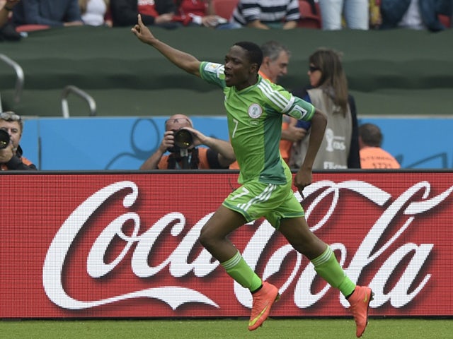 Nigeria's forward Ahmed Musa celebrates his second goal during a Group F football match between Nigeria and Argentina at the Beira-Rio Stadium in Porto Alegre during the 2014 FIFA World Cup on June 25, 2014