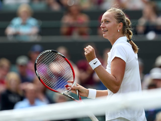  Petra Kvitova of Czech Republic celebrates after winning her Ladies' Singles second round match against Mona Barthel of Germany on day three of the Wimbledon Lawn Tennis Championships at the All England Lawn Tennis and Croquet Club at Wimbledon on June 2