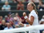  Petra Kvitova of Czech Republic celebrates after winning her Ladies' Singles second round match against Mona Barthel of Germany on day three of the Wimbledon Lawn Tennis Championships at the All England Lawn Tennis and Croquet Club at Wimbledon on June 2