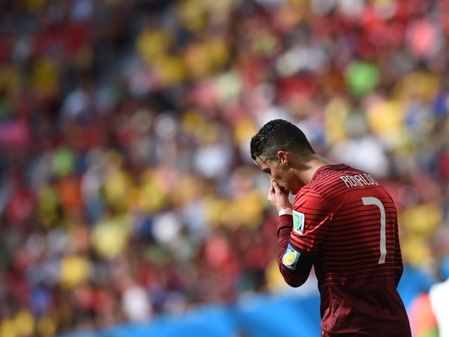 Portugal's forward and captain Cristiano Ronaldo reacts during the Group G football match between Portugal and Ghana at the Mane Garrincha National Stadium in Brasilia during the 2014 FIFA World Cup on June 26, 2014