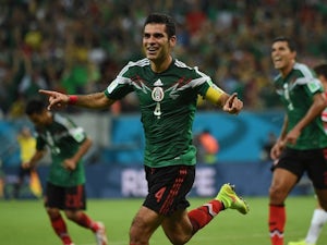 Mexico's defender Rafael Marquez celebrates after scoring during a Group A football match between Croatia and Mexico at the Pernambuco Arena in Recife during the 2014 FIFA World Cup on June 23, 2014