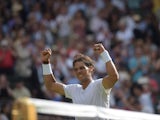 Spain's Rafael Nadal celebrates beating Slovakia's Martin Klizan during their men's singles first round match on day two of the 2014 Wimbledon Championships at The All England Tennis Club in Wimbledon, southwest London, on June 24, 2014