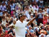 Roger Federer of Switzerland celebrates after defeating his Gentlemen's Singles first round match against Paolo Lorenzi of Italy on day two of the Wimbledon Lawn Tennis Championships at the All England Lawn Tennis and Croquet Club at Wimbledon on June 24,