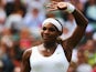 Serena Williams of the United celebrates after winning her Ladies' Singles second round match against Chanelle Scheepers on June 26, 2014