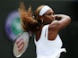 Serena Williams of the United States hits a forehand return during her Ladies' Singles third round match against Alize Cornet on June 28, 2014
