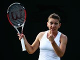 Simona Halep of Romania during her Ladies' Singles third round match against Belinda Bencic of Switzerland on day six of the Wimbledon Lawn Tennis Championships at the All England Lawn Tennis and Croquet Club at Wimbledon on June 28, 2014