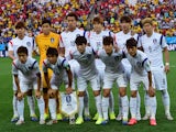 South Korea's players pose prior to a Group H football match between South Korea and Belgium at the Corinthians Arena in Sao Paulo during the 2014 FIFA World Cup on June 26, 2014
