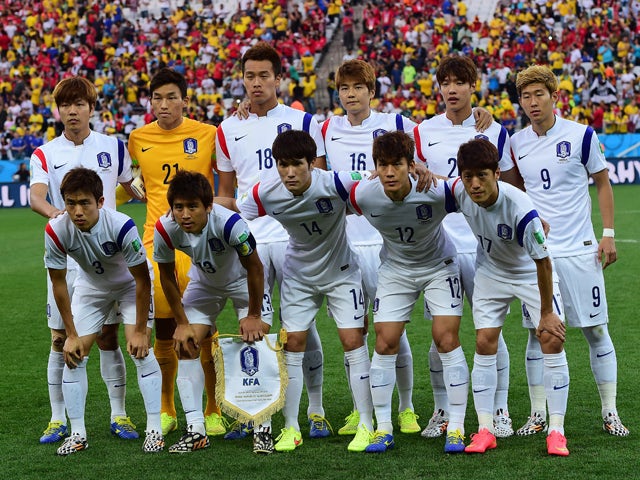 South Korea's players pose prior to a Group H football match between South Korea and Belgium at the Corinthians Arena in Sao Paulo during the 2014 FIFA World Cup on June 26, 2014