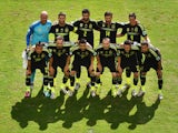 Spain pose for a team photo prior to the 2014 FIFA World Cup Brazil Group B match between Australia and Spain at Arena da Baixada on June 23, 2014