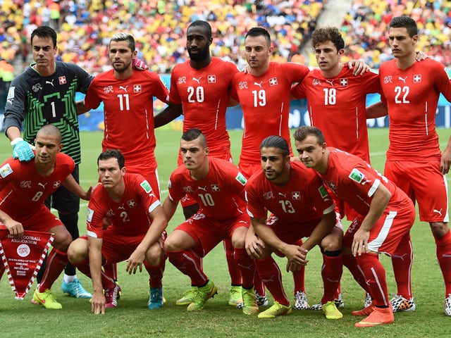 Switzerland's squad pose for a group picture before the start of the Group E football match between Honduras and Switzerland at the Amazonia Arena in Manaus during the 2014 FIFA World Cup on June 25, 2014