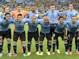 Uruguay players pose before the Round of 16 football match between Colombia and Uruguay at the Maracana Stadium in Rio de Janeiro during the 2014 FIFA World Cup on June 28, 2014