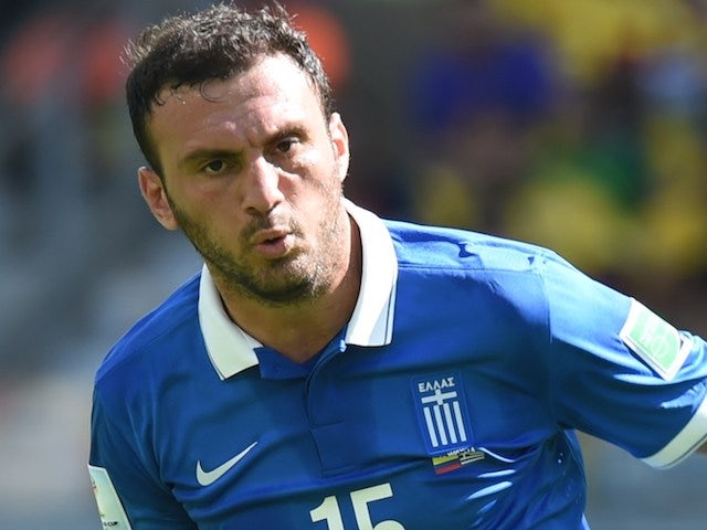 Greece's defender Vasilis Torosidis in action during a Group C football match between Colombia and Greece at the Mineirao Arena in Belo Horizonte during the 2014 FIFA World Cup on June 14, 2014