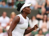 US player Venus Williams returns against Spain's Maria-Teresa Torro-Flor during their women's singles first round match on day one of the 2014 Wimbledon Championships at The All England Tennis Club in Wimbledon, southwest London, on June 23, 2014